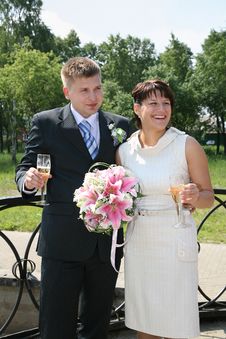 Newly-married Couple On The Bridge Royalty Free Stock Photo Newly-married Couple On The Bridge Royalty Free Stock Photo