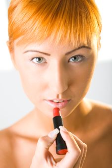 Woman Applying Lipstick Stock Image Woman Applying Lipstick Stock Image