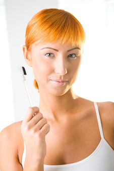 Young Woman With Makeup Brush Stock Images Young Woman With Makeup Brush Stock Images
