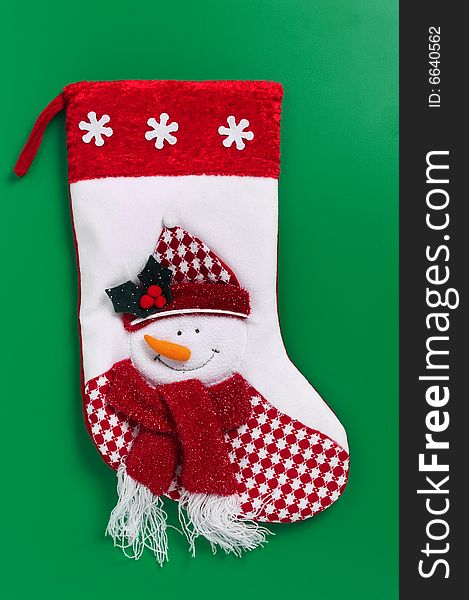 A christmas stocking isolated in green