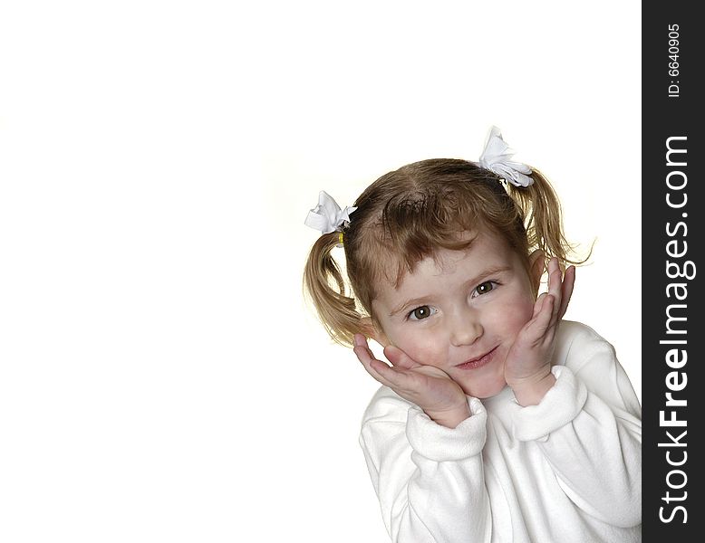 Little girl dressed in white making faces expressions. Little girl dressed in white making faces expressions