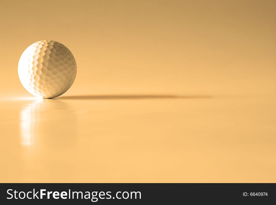 Closeup of golfball with dark shadows. Closeup of golfball with dark shadows