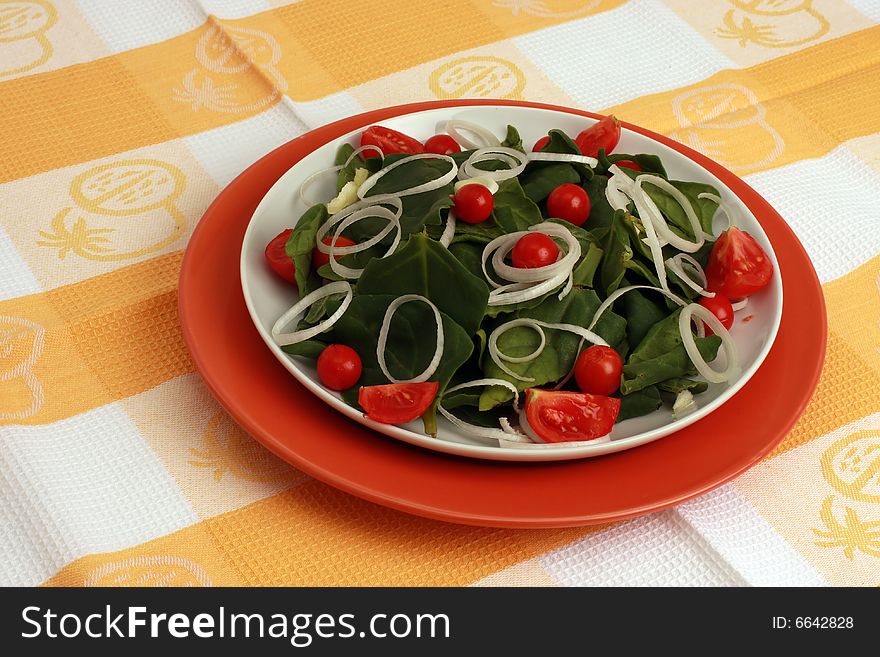 Colorful Spinach Salad On A Table