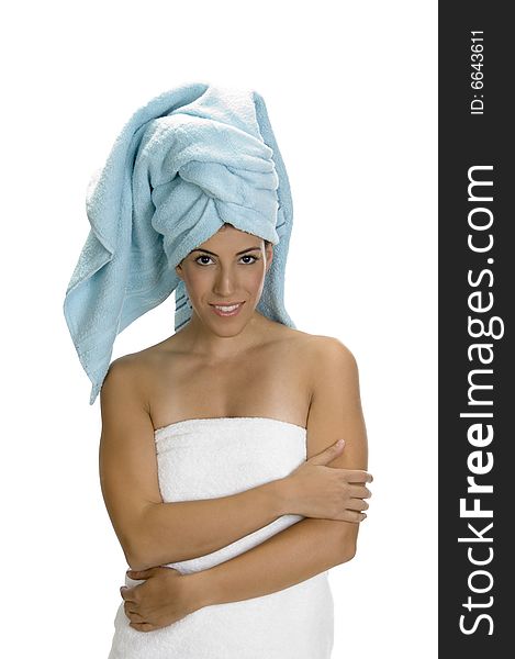 A lady in towel and looking at camera