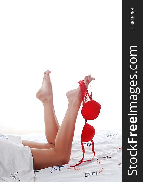 Picture of beautiful woman's legs with red bra. Picture of beautiful woman's legs with red bra