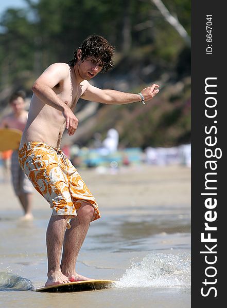 Young skimboarder