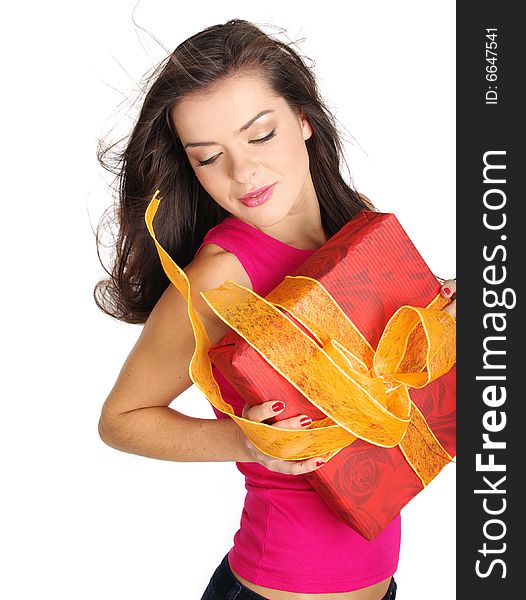 girl smiles and holding a gift in packing. girl smiles and holding a gift in packing