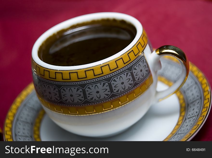 A Cup of Turkish Coffee on deep red backgroud