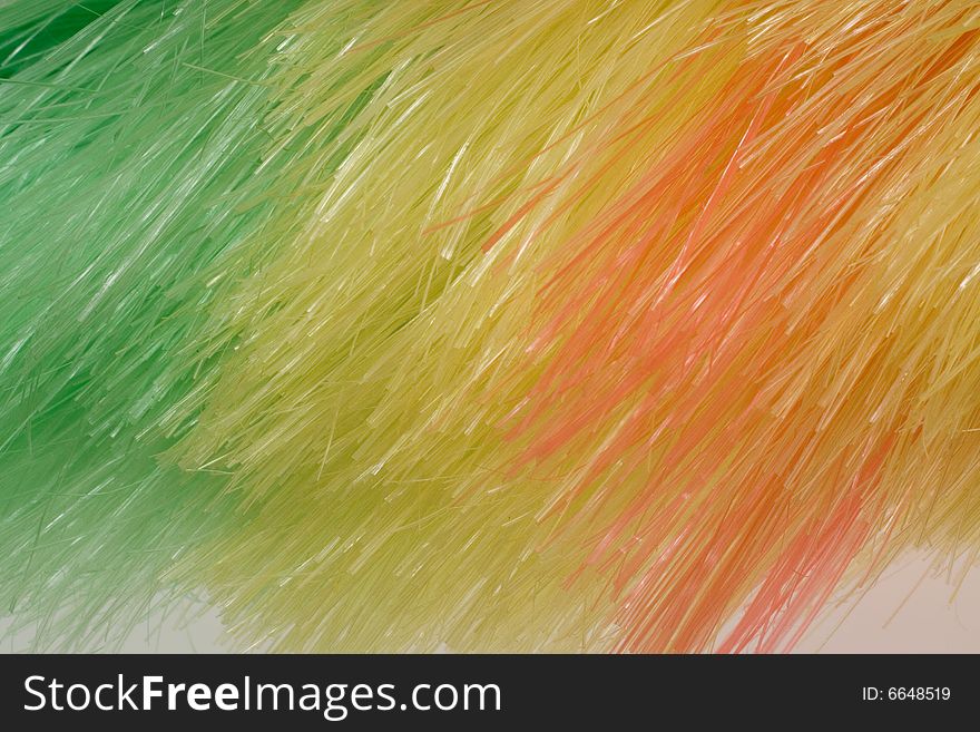 Rainbow background of artificial fibres