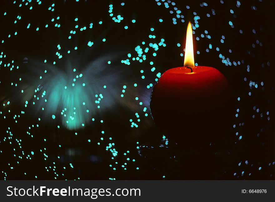 Stars and relaxing light of a candle