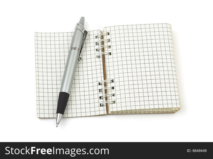 Pen and note pad isolated on white background