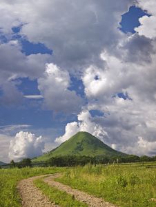 Lonely Mountain Under Quaint Clouds In Sunny Day Royalty Free Stock Photo Lonely Mountain Under Quaint Clouds In Sunny Day Royalty Free Stock Photo