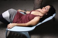 Female On A Reclining Chair Stock Images Female On A Reclining Chair Stock Images