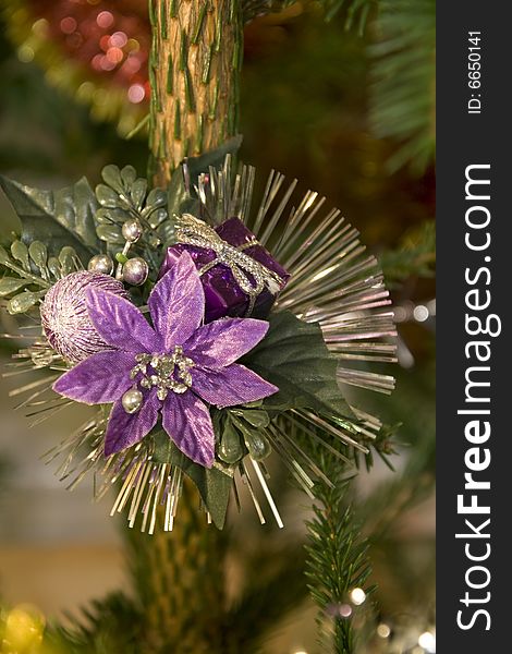 Violet flower on christmas tree