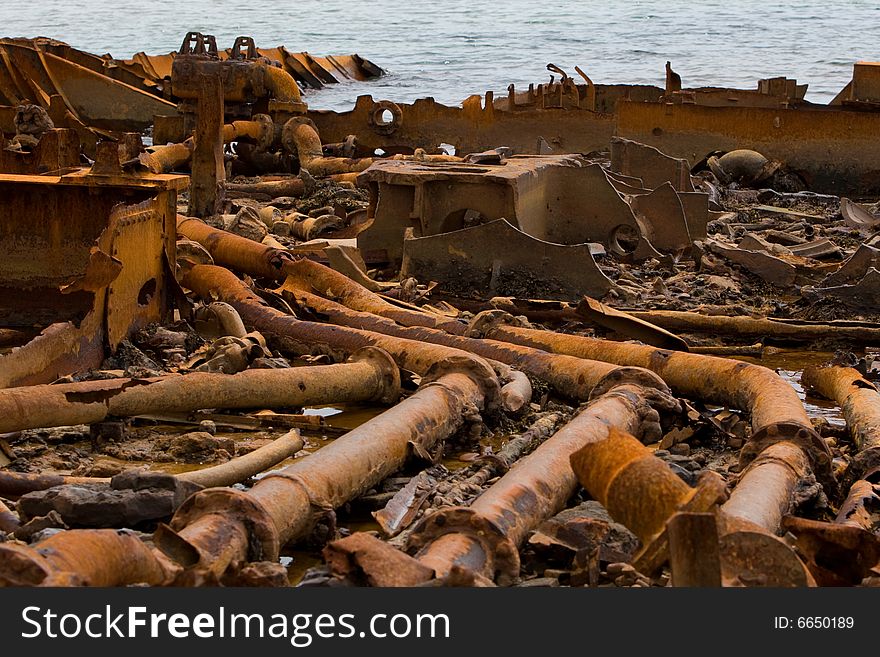 Rusty boat wreck on the beach. Rusty boat wreck on the beach