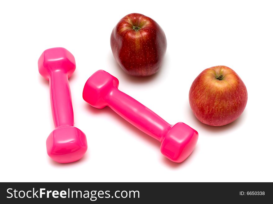 Dumbbells and apples on the white,fitness. Dumbbells and apples on the white,fitness