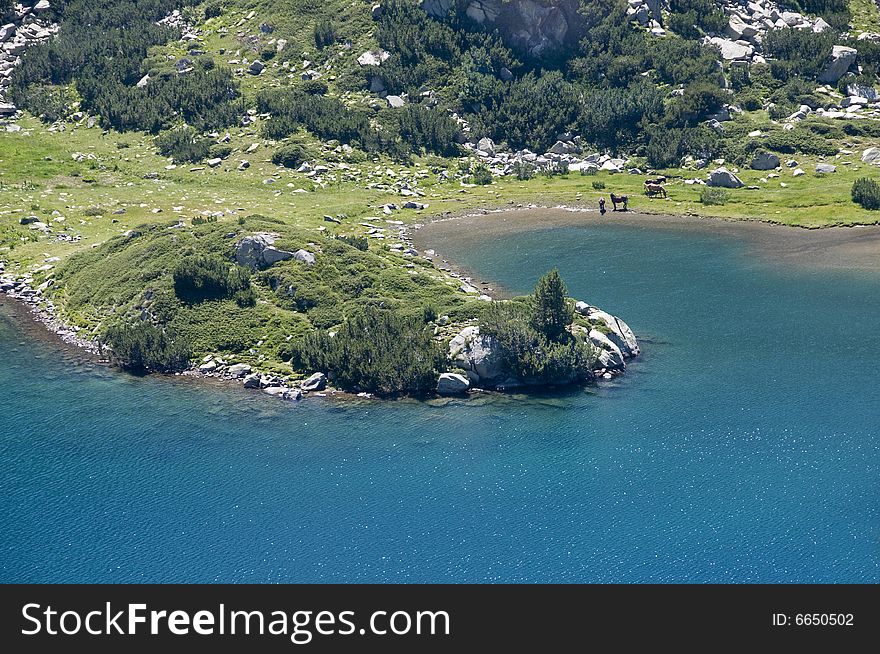 Lake in the prin mountains with clear blue water. Lake in the prin mountains with clear blue water