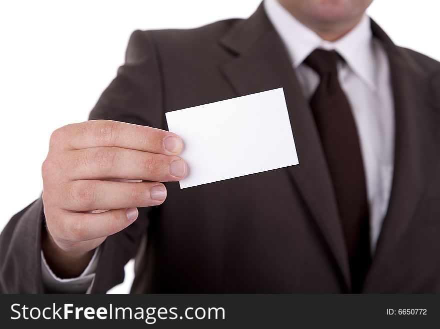 Businessman showing his business card, focus on fingers and card. Businessman showing his business card, focus on fingers and card.