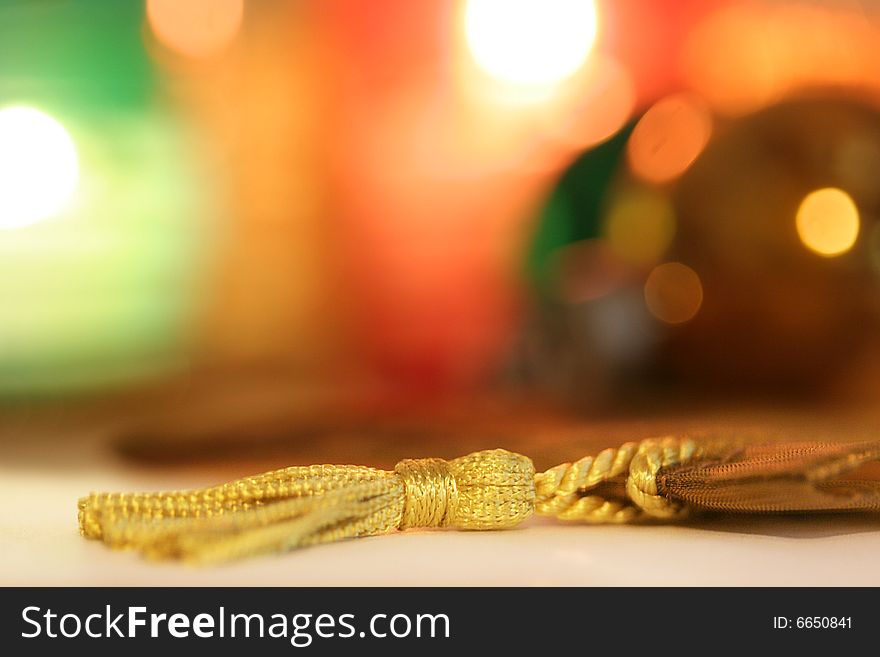 Golden tassel with colorful background