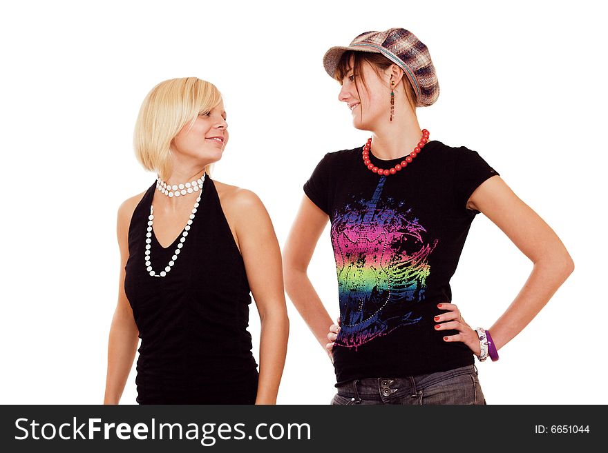 Two young girls looking at each other on white background. Two young girls looking at each other on white background