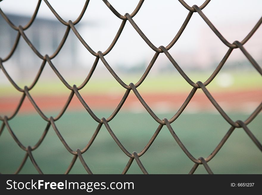 Chain link fence with a blue sky