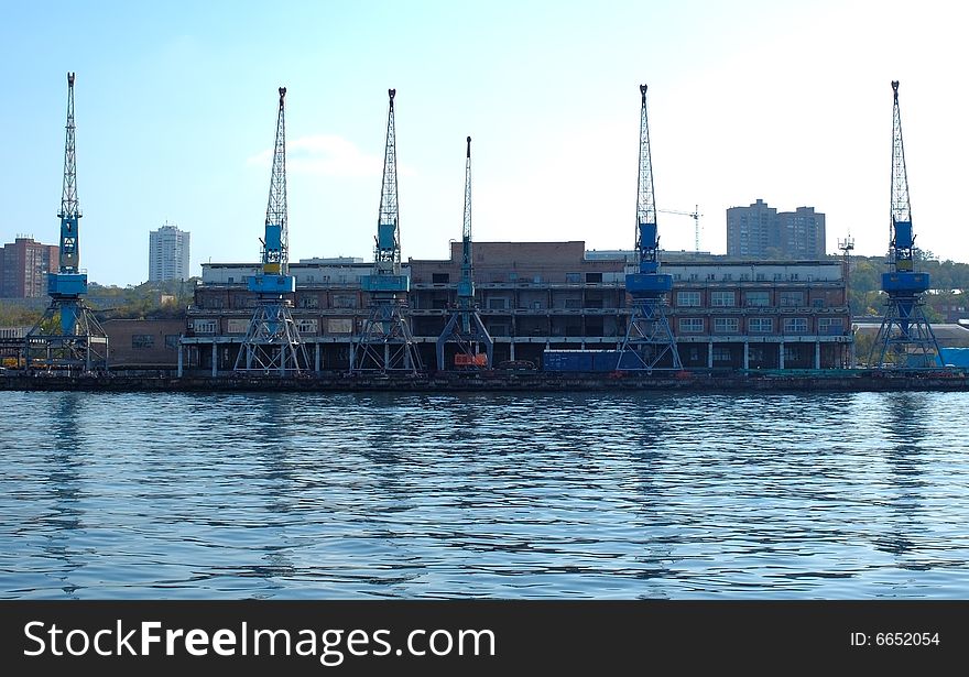 Old shipment pier (stage) in russian seaport (Vladivostok). Old shipment pier (stage) in russian seaport (Vladivostok).