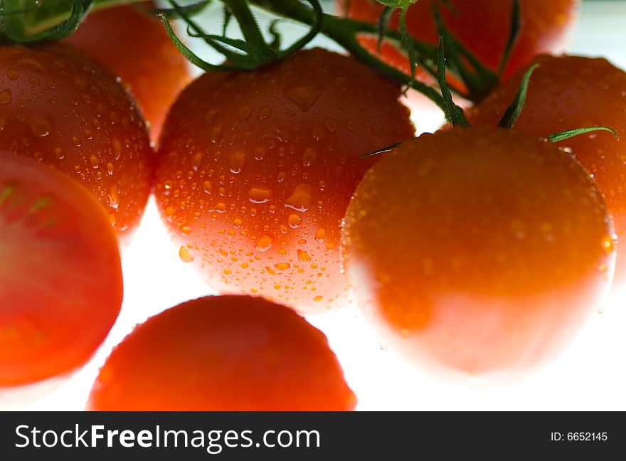 Close up of tomatoes on a lightening desk