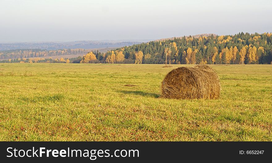 Haystack in the field. Autumn.