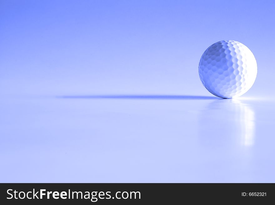 Closeup of golfball with dark shadows. Closeup of golfball with dark shadows