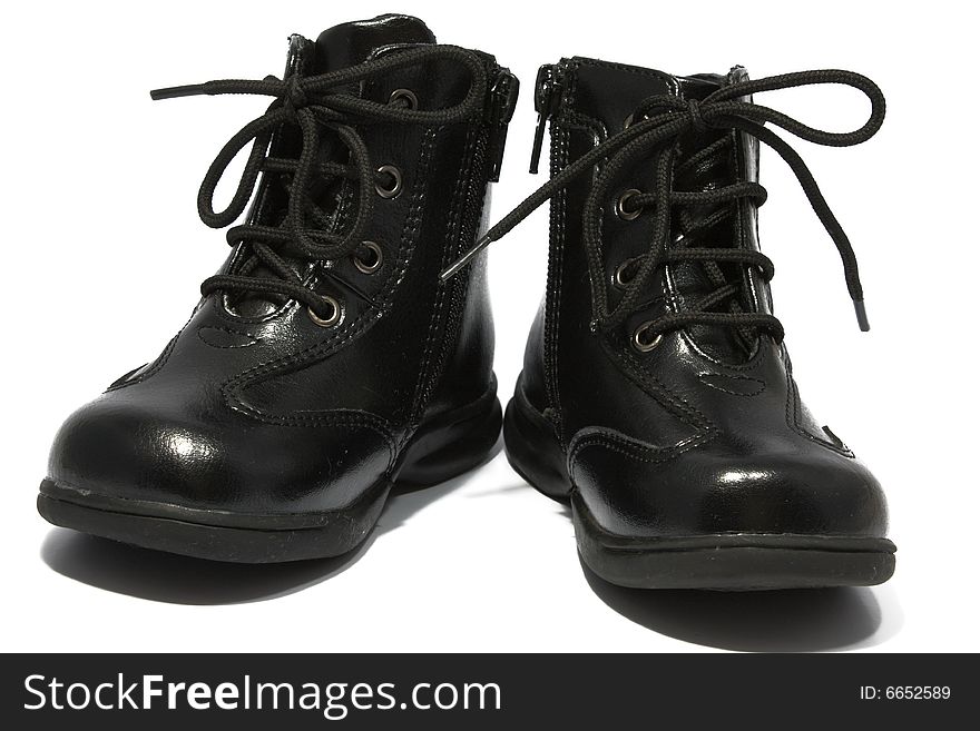 Children's boots black, leather, autumn on a white background