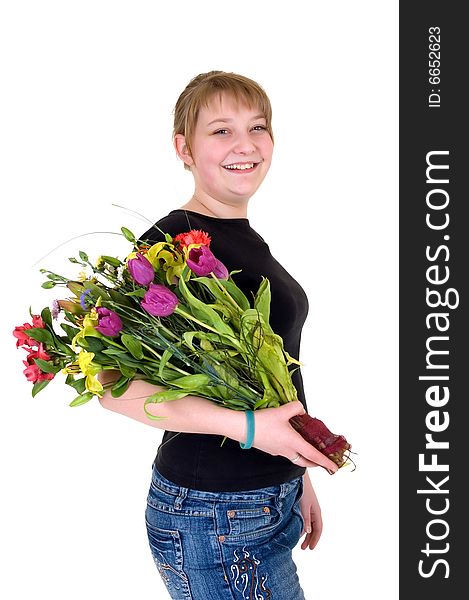 Happy smiling young girl presenting flowers, white background, studio shot