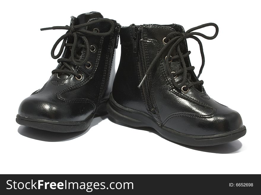 Children's boots black, leather, autumn on a white background