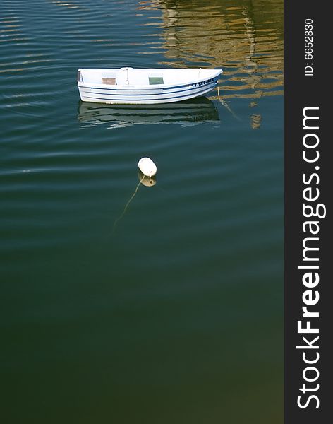 Dinghy moored in harbor at Rockport Massachusetts