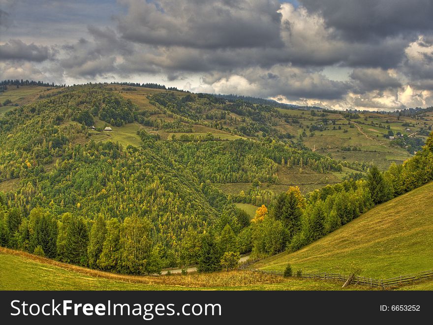 Autumn mountain landscape in a cloudy day.Location:Apuseni Mountains,Romania.(HDR image). Autumn mountain landscape in a cloudy day.Location:Apuseni Mountains,Romania.(HDR image)