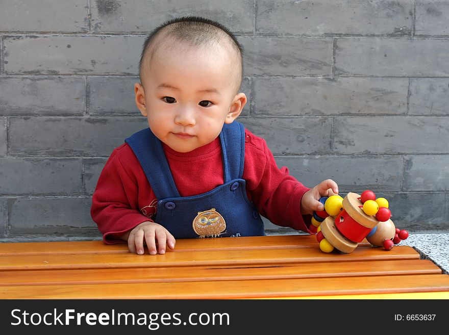 The young boy and his toy