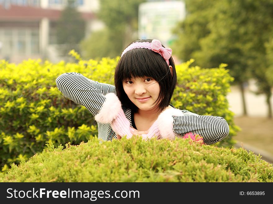 A beautiful female student on campus. A beautiful female student on campus.