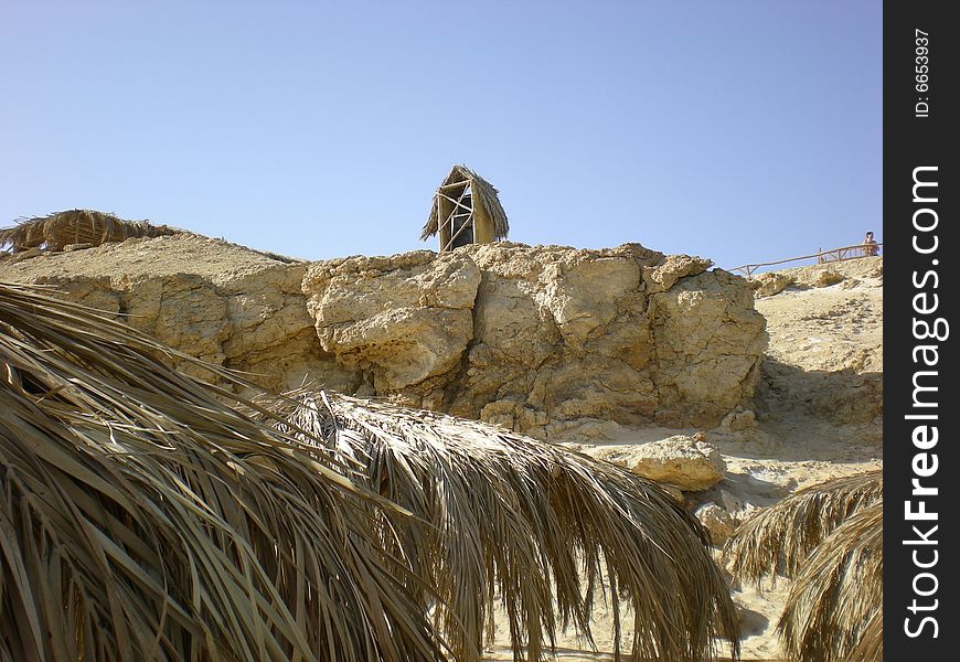 A quiet thatch hut on the beach. A quiet thatch hut on the beach