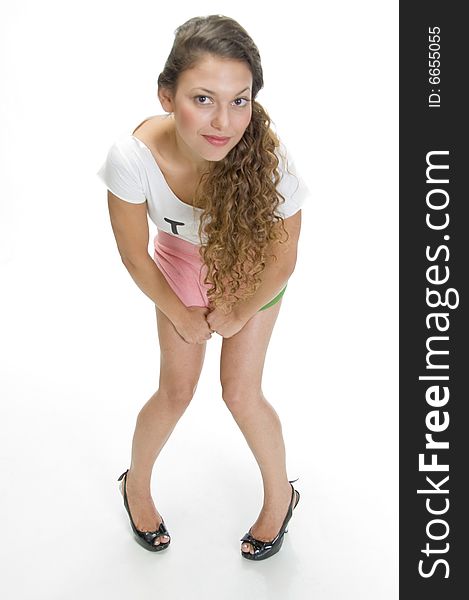 A beautiful female model looking at camera on an isolated white background