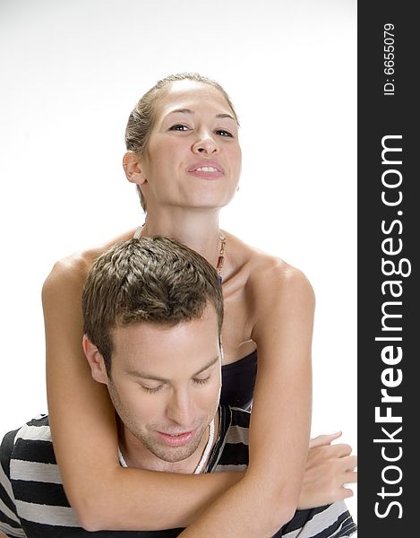 Young Man Giving Piggyback To Woman