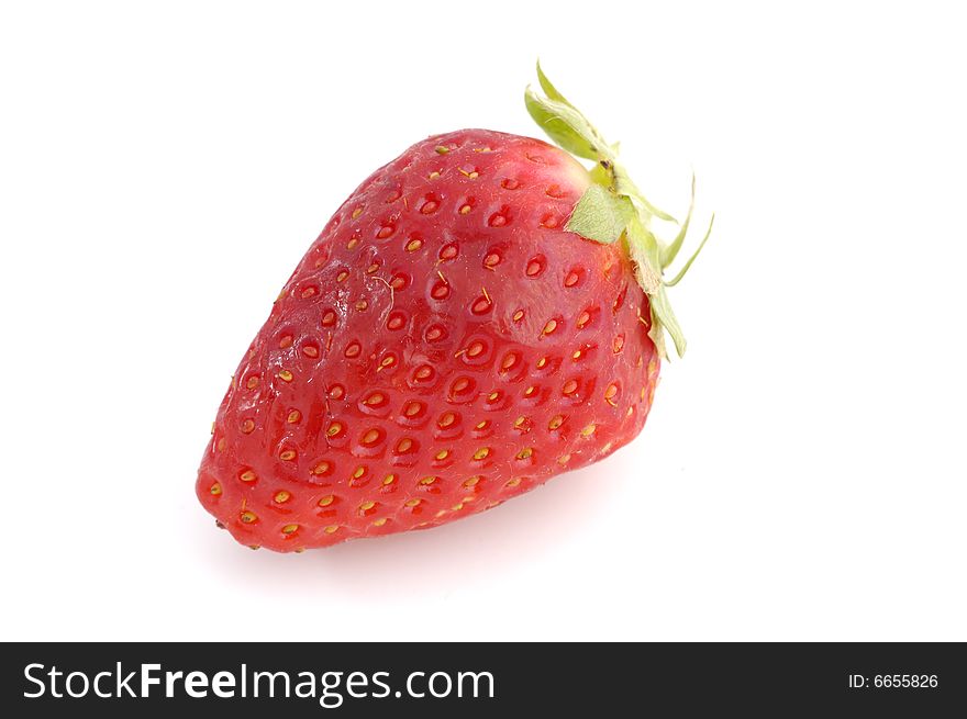 Appetizing brightly red strawberry on a white background