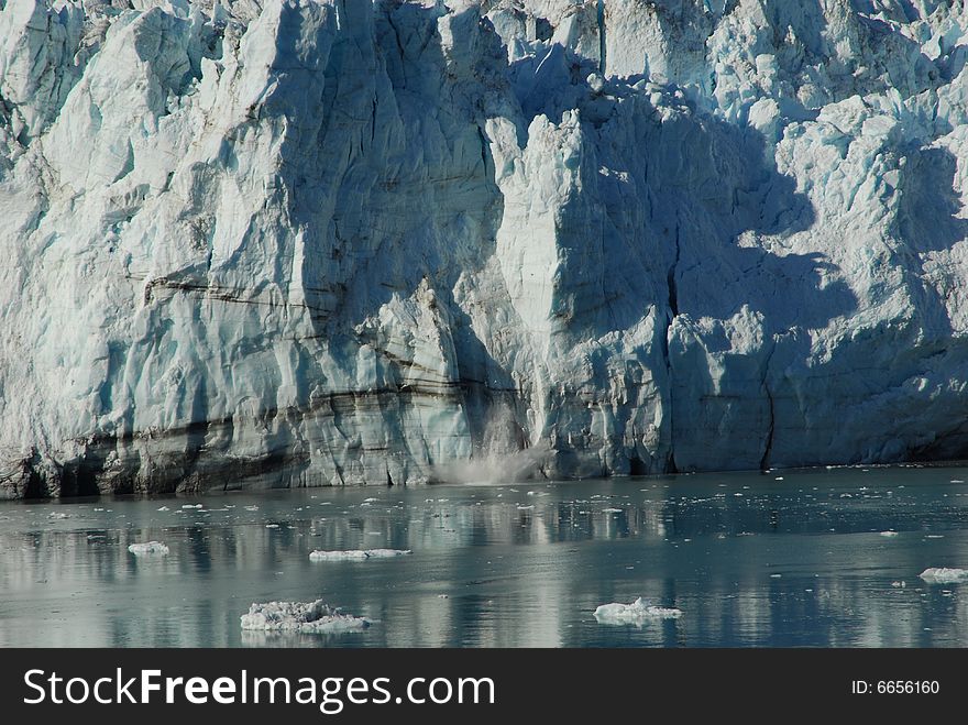 Calving Magerie Glacier in Glacier Bay Alaska