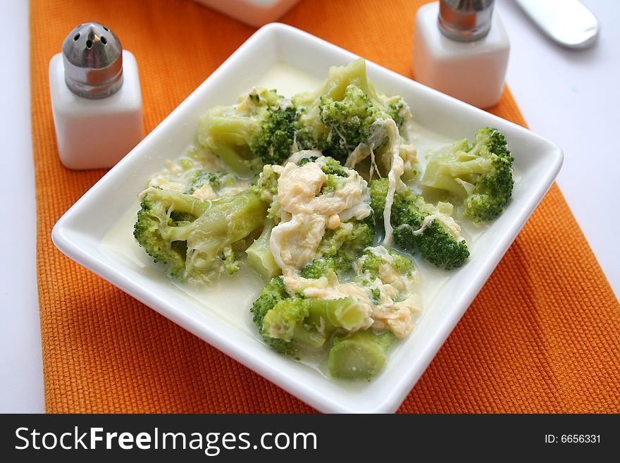 A fresh soup of broccoli vegetables and eggs