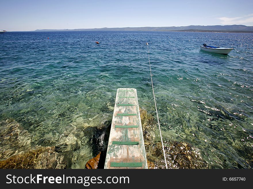 Jetty in the mediterranean sea on the island of Brac, Croatia