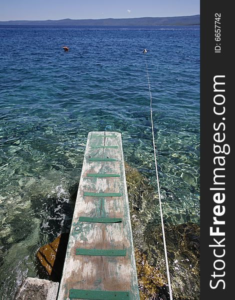 Jetty in the mediterranean sea on the island of Brac, Croatia