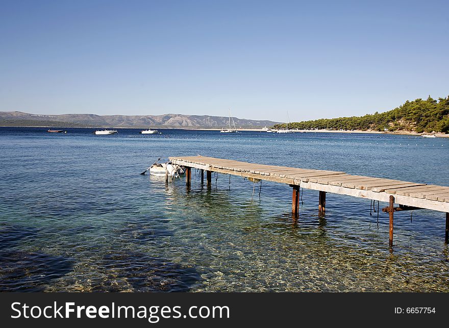 Jetty in the mediterranean sea on the island of Brac, Croatia