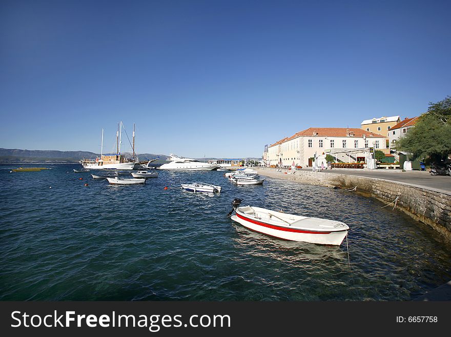 Traditional fishing boats in the harbour of bol on Brac island in Croatia