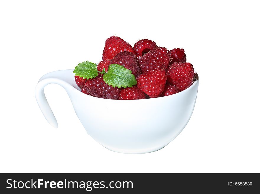 Raspberry in cup on white background