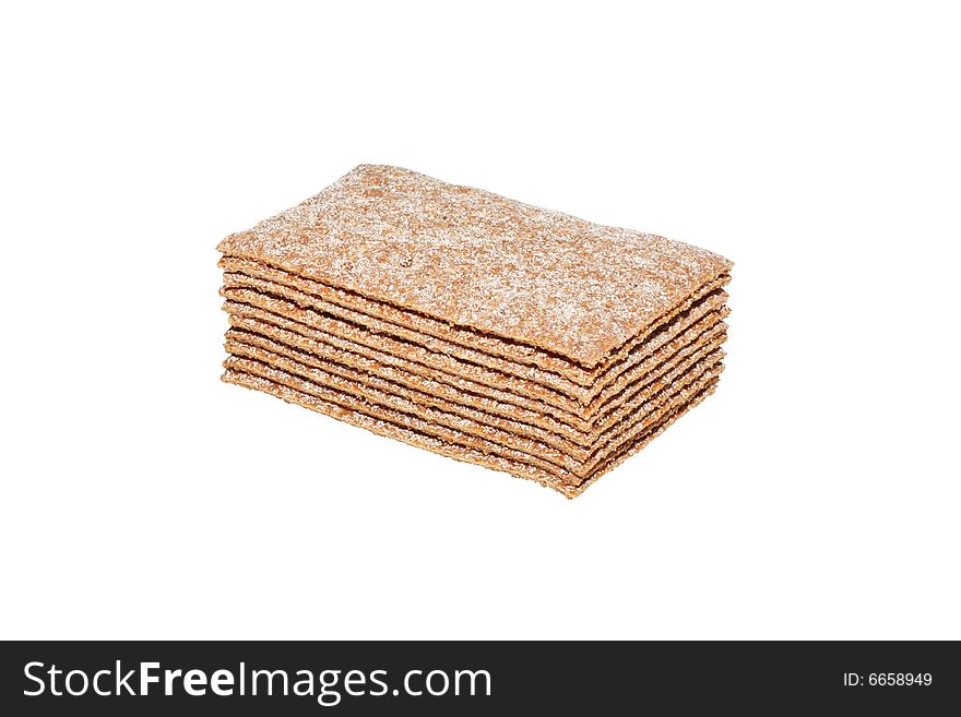 Stack of crispbread slices isolated on white