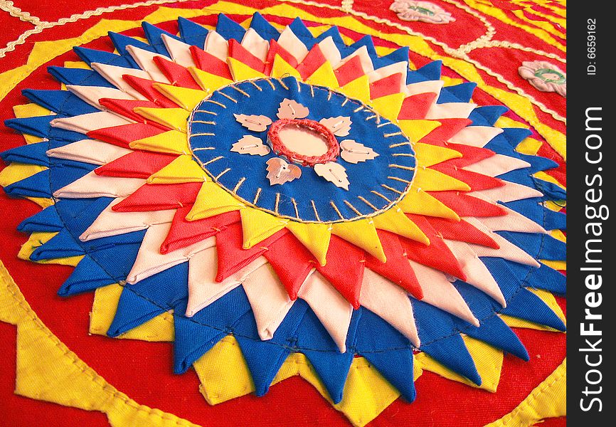 A beautiful colorful cotton table cloth, of traditional India. A beautiful colorful cotton table cloth, of traditional India