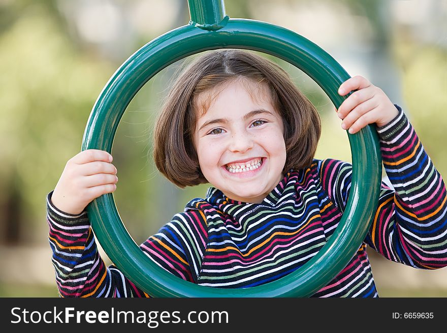 Girl Playing at the Playground